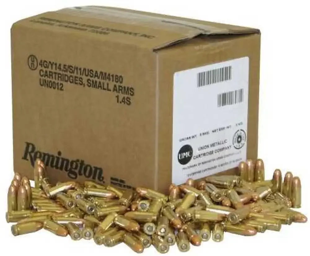 Remington UMC 9mm ammo bulk pack with brass cartridges scattered around box